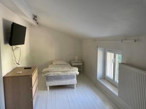 Maisons de vacances Maison de village avec jardin : photos des chambres