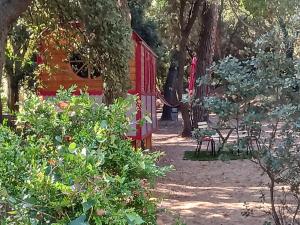 Tentes de luxe La roulotte du petit paradis : photos des chambres