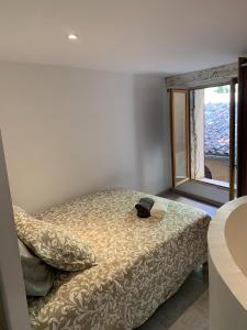 Appartements Au coeur du Village : photos des chambres
