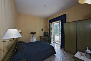 Camera Tripla con Balcone