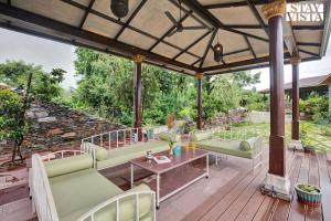 StayVista at The Earthen Boutique with Spacious Pool, Terrace, Lawn & Games