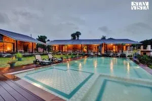 StayVista's The Earthen Boutique - City Escape with Spacious Pool, Terrace, Lawn & Indoor-Outdoor Games - Dūngarpur