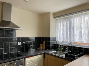 Self contained 1 bed flat next with free parking, adjacent to metro station also direct bus to O2 and Excel via Cable Car
