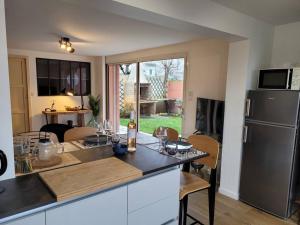 Appartements L-atelier, appart avec jardin a 100 m de la mer. : photos des chambres