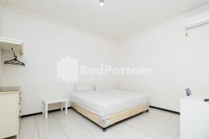 Dukuh Kupang Residence Mitra RedDoorz