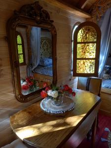 Tentes de luxe La roulotte du petit paradis : photos des chambres