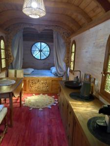 Tentes de luxe La roulotte du petit paradis : photos des chambres