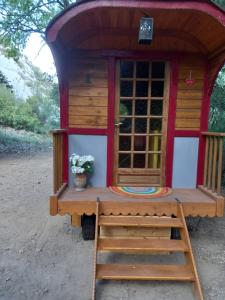 Tentes de luxe La roulotte du petit paradis : photos des chambres