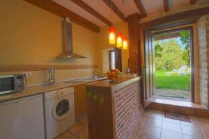 Apartamento La Ermita con jardín