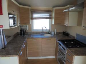 Golden Palm : LE Cottage Gold 8 Berth, Panel Heated