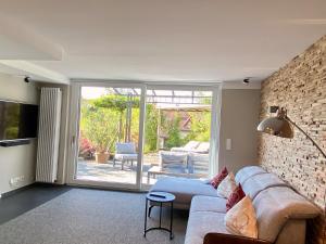 Terrassenwohnung Garten-Oase - Hochwertige Gartenwohnung mit Sonnenterrasse