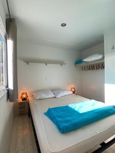Campings Mobil-home 5 personnes dans camping Mar Estang 4 etoiles avec acces a la plage : photos des chambres