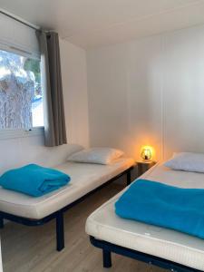 Campings Mobil-home 5 personnes dans camping Mar Estang 4 etoiles avec acces a la plage : photos des chambres
