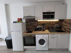 Appartements Studio cosy a 5 minutes de DISNEYLAND PARIS : photos des chambres