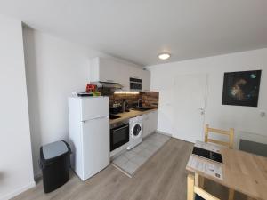 Appartements Studio cosy a 5 minutes de DISNEYLAND PARIS : photos des chambres