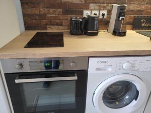 Appartements Studio cosy a 5 minutes de DISNEYLAND PARIS : photos des chambres