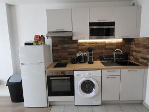 Appartements Studio cosy a 5 minutes de DISNEYLAND PARIS : photos des chambres