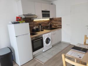 Appartements Studio cosy a 5 minutes de DISNEYLAND PARIS : photos des chambres