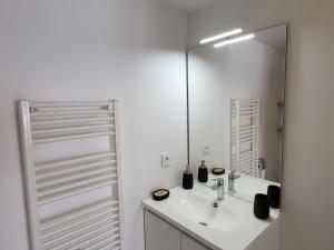Appartements Studio cosy a 5 minutes de DISNEYLAND PARIS : photos des chambres