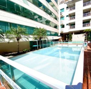 Apartamentos com piscinas na praia de Bombas