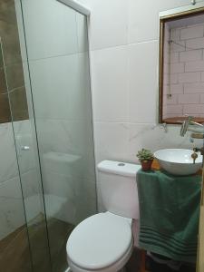 Pé na Areia Sons do Mar