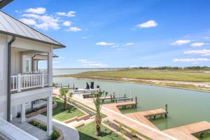 GOLDEN DREAMS ON ST. CHARLES BAY