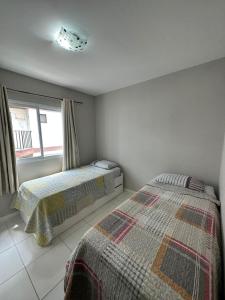 Apartamento 3 Quartos em Frente à Praia do Forte