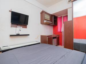 Apartemen Green Lake View Ciputat by Alfa Rooms