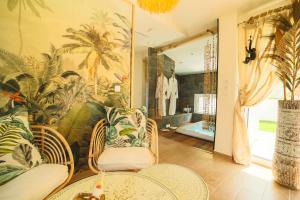 B&B / Chambres d'hotes O Balinais mini villa avec spa et piscine privatif : photos des chambres