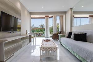 2 SUÍTES Vista MAR Praia do Recreio e Pedra do Pontal - Condomínio com Estacionamento e Portaria 24h - Cozinha Completa, Wi-Fi e Ar Condicionado