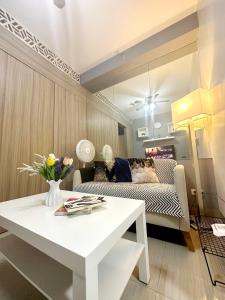 Fully equipped 1BR Condo at Shore2 near to MOA