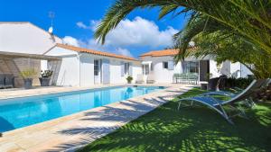 Villas Superbe villa avec piscine chauffee a proximite de la plage : photos des chambres