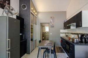 Appartements Appartement Lou Paradou : photos des chambres