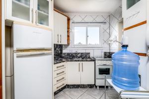 Apto cchurrasq a 10min da praia de Jurerê RFL203