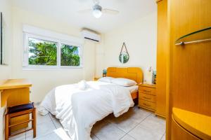 Apto cchurrasq a 10min da praia de Jurerê RFL203