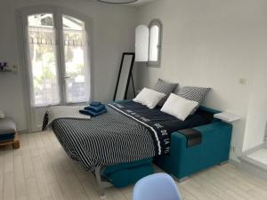 Maisons de vacances Adorable petite maison a 400m de la mer : photos des chambres