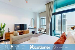 Vacationer Holiday Homes I Elegant Studio I Pool with Burj Khalifa Views l Business Bay