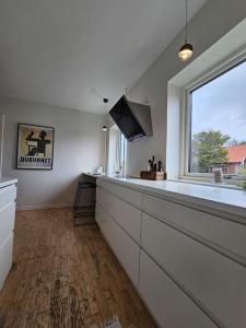 Lejlighed med altan og gratis parkering