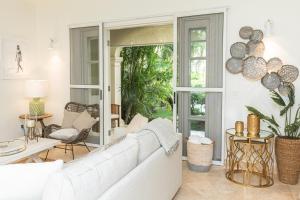 Beach Happy Beachfront Apartment by One Caribbean Estates