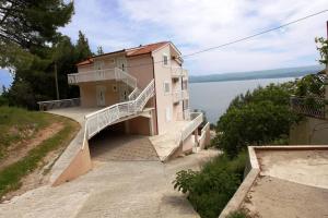 Two-Bedroom Apartment with Balcony and Sea View room in Apartments Ivančić