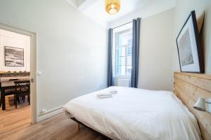 Appartements La Vie est Belle - Entre ski et thermes : photos des chambres