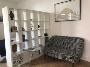 Appartements LE NID DES HALLES, au coeur du Boulingrin : photos des chambres