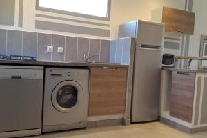 Appartements Studio climatise avec terrasse, fibre et Wi FI . : photos des chambres