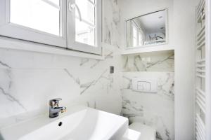 Appartements Pick A Flat-s Apartements in Louvre-Rivoli - Rue du Roule : photos des chambres