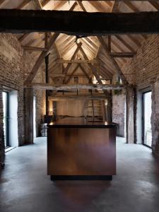 Hoeve Appartement aan de rand van Maastricht met natuurzwembad