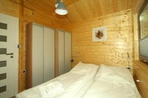 Całoroczny drewniany domek Superior i apartamenty Eko-oaza w Krynica Morska-Piaski