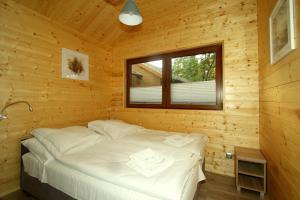 Całoroczny drewniany domek Superior i apartamenty Eko-oaza w Krynica Morska-Piaski