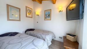 Villas Charmante location en 2 parties dans le village de Loix : photos des chambres