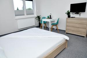 Pokoje, Apartamenty, Restauracja Marcus