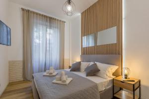 Imperium House - appartamento con giardino privato, 3 minuti da Metro Piazza Bologna, A-C,